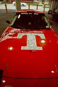 Andrew Havas / Rod Hendricksen had people sign the "T" on the hood of their Mazda RX-7 at parc expose.