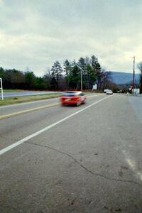 The Gail Truess / Pattie Hughes-Mayer Mazda 323GTX heads out to the stages.