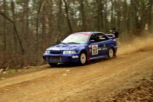 Seamus Burke / Frank Cunningham Mitubishi Lancer Evo VI at speed on SS11, Clear Creek I.