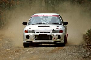 Tim Paterson / Scott Ferguson Mitsubishi Lancer Evo IV at speed on SS11, Clear Creek I.