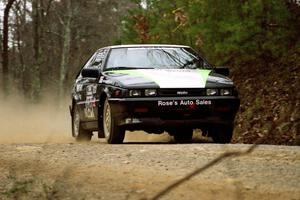 Randy Bailey / Will Perry Isuzu Impulse at speed on SS11, Clear Creek I.