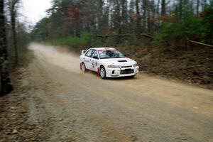 Paul Dunn / Rebecca Dunn Mitubishi Lancer Evo IV at speed on SS11, Clear Creek I.