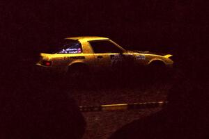 Scott Justus / Eric Alimena Mazda RX-7 at the spectator corner on SS14, White Oak Flats II.