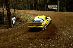 Nui Srisook / Sumit Panjabi Mazda RX-7 at the spectator corner on SS14, White Oak Flats II.