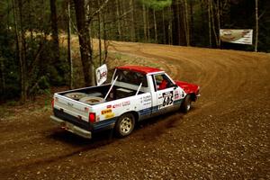 Paul Flores / Sean Figgins Nissan Pickup at the spectator corner on SS14, White Oak Flats II.