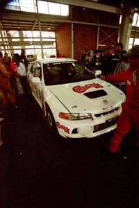 Richard Tuthill / John Bennie pull into the finish in their Mitsubishi Lancer Evo IV.