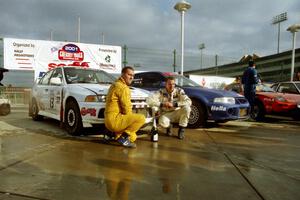 Richard Tuthill / John Bennie pose in front of their winning Mitsubishi Lancer Evo IV.