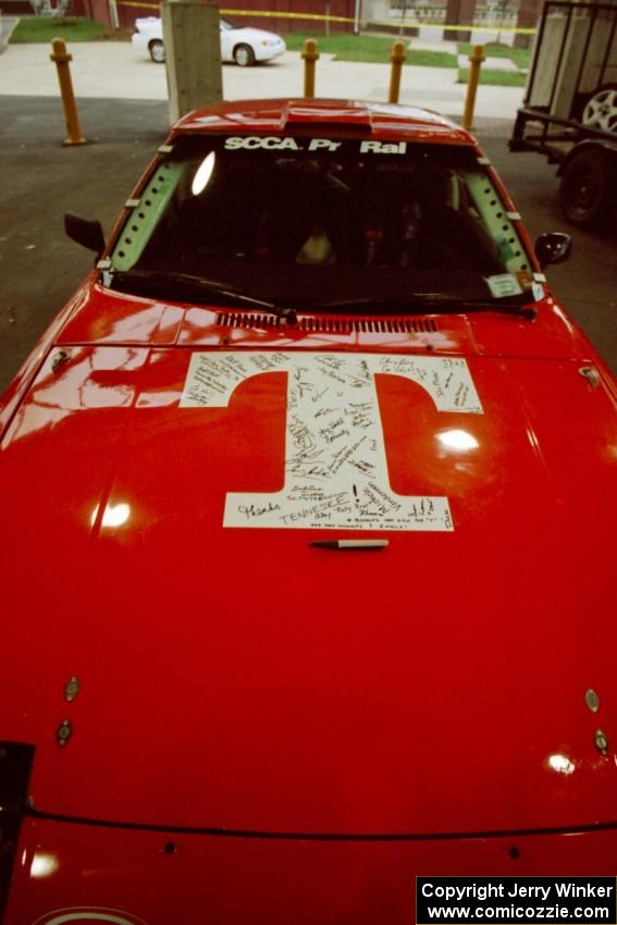 Andrew Havas / Rod Hendricksen had people sign the "T" on the hood of their Mazda RX-7 at parc expose.