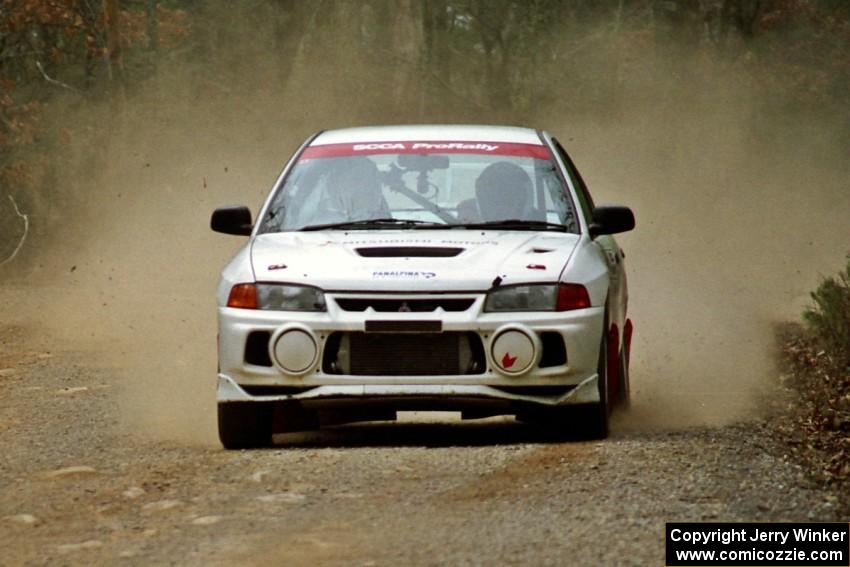 Tim Paterson / Scott Ferguson Mitsubishi Lancer Evo IV at speed on SS11, Clear Creek I.