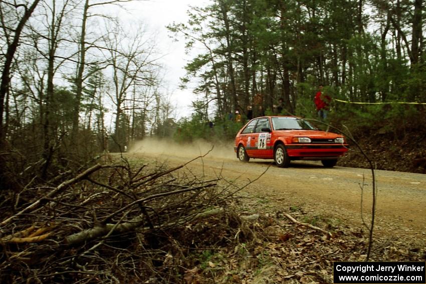 Gail Truess / Pattie Hughes-Mayer Mazda 323GTX at speed on SS11, Clear Creek I.