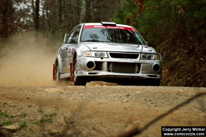 Mark Nelson / David Watts Mitsubishi Lancer Evo VI at speed on SS11, Clear Creek I.