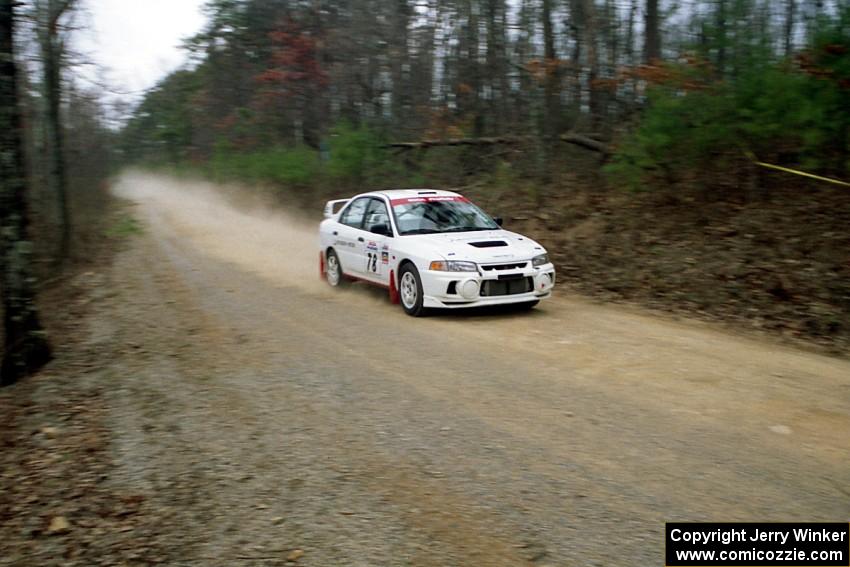 Paul Dunn / Rebecca Dunn Mitubishi Lancer Evo IV at speed on SS11, Clear Creek I.