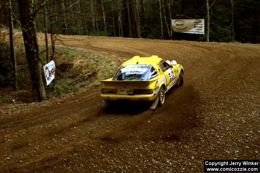 Nui Srisook / Sumit Panjabi Mazda RX-7 at the spectator corner on SS14, White Oak Flats II.