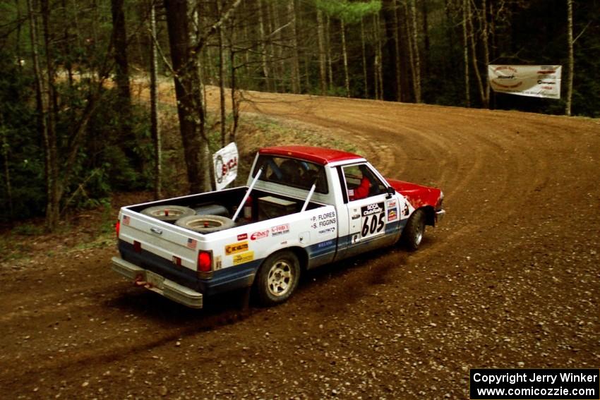 Paul Flores / Sean Figgins Nissan Pickup at the spectator corner on SS14, White Oak Flats II.