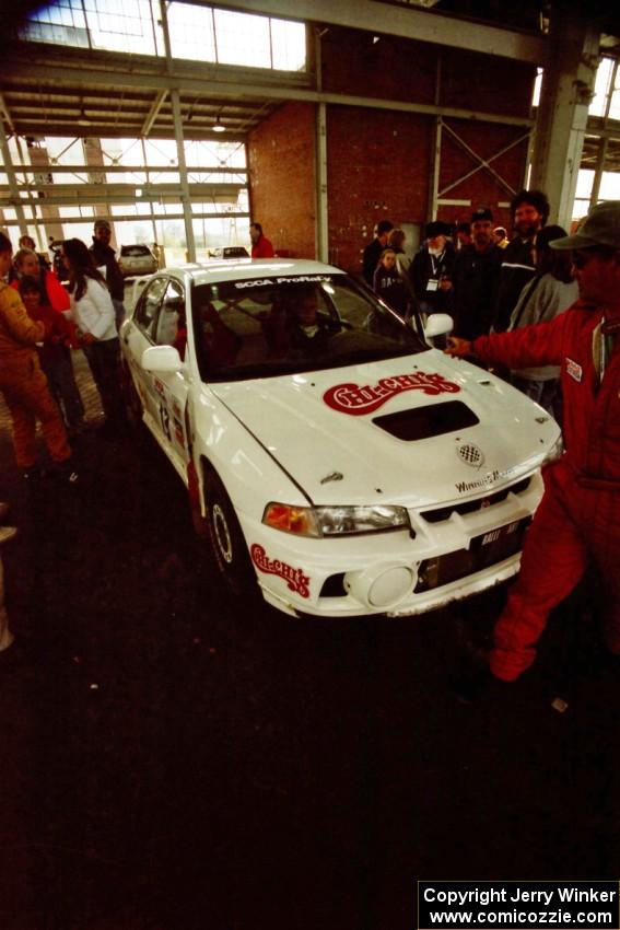 Richard Tuthill / John Bennie pull into the finish in their Mitsubishi Lancer Evo IV.