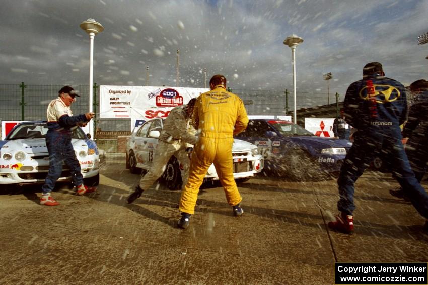 The winners' ceremonial champagne spray.