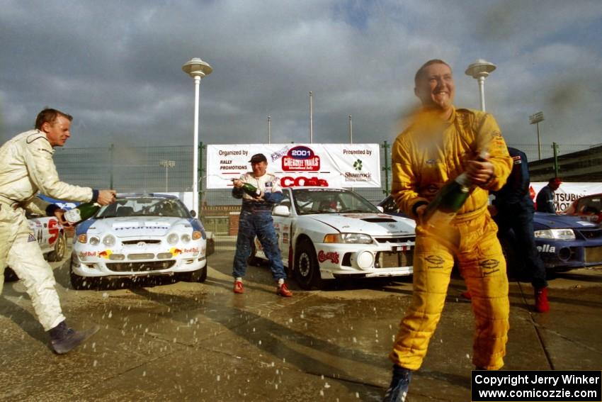 The winners' ceremonial champagne spray.