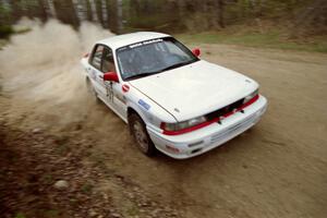 Todd Jarvey / Rich Faber drift their Mitsubishi Galant VR-4 through a 90-right on Indian Creek Rd., SS1.