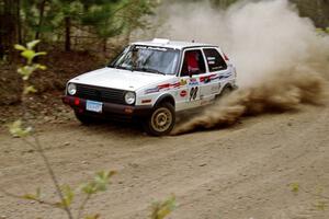 Bob Nielsen / Ed Wahl at speed through a 90-right on Indian Creek Rd.,SS1, in their VW GTI.