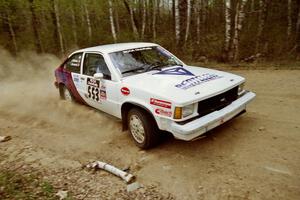 The Jerry Brownell / Jim Windsor Chevy Citation drifts through a 90-right on Indian Creek Rd., SS1.