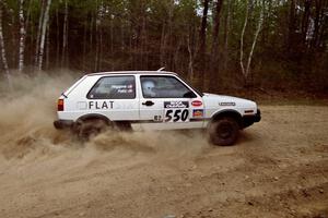 Aaron Hatz / Brendan Higgins drift through a 90-right on Indian Creek Rd., SS1, in their VW GTI.