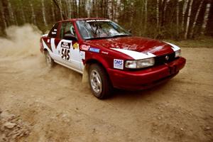 Eric Seppanen / Jake Himes drift through a 90-right on Indian Creek Rd., SS1, in their Nissan Sentra SE-R.