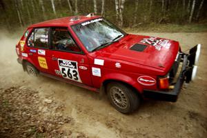 Gary Starr / Bill Tifft at a 90-right on Indian Creek Rd., SS1, in their Dodge Omni GLH Turbo.