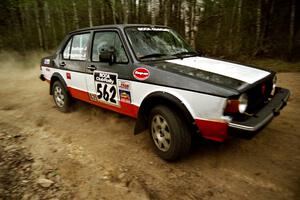 Mike Christopherson / Brian Dondlinger drift their VW Jetta through a 90-right on Indian Creek Rd., SS1.