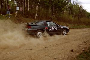 Paul Peters / Bob Anderson come out of a 90-right on Indian Creek Rd., SS1, in their Mitsubishi Eclipse GSX.