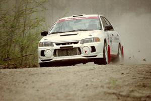 Paul Dunn / Rebecca Dunn at speed in the Two Inlets State Forest in their Mitsubishi Lancer Evo IV.