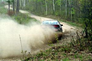 Dennis Martin / Chris Plante at speed in the Two Inlets State Forest in their Mitsubishi Eclipse GSX.