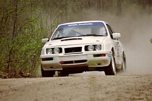 Colin McCleery / Jeff Secor at speed in the Two Inlets State Forest in their Merkur XR4Ti.