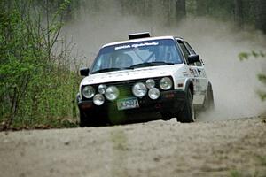 The Aaron Hatz / Brendan Higgins VW GTI at speed in the Two Inlets State Forest.