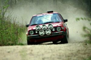 Al Kintigh / Diane Sargent at speed in the Two Inlets State Forest in their VW GTI.