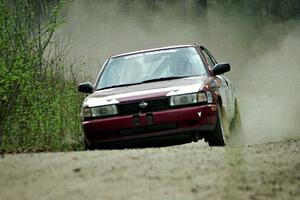 Eric Seppanen / Jake Himes at speed in the Two Inlets State Forest in their Nissan Sentra SE-R.