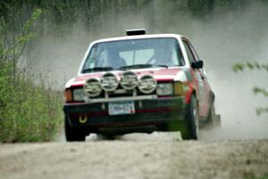 Jason Lajon / James Bialas at speed in the Two Inlets State Forest in their VW GTI.