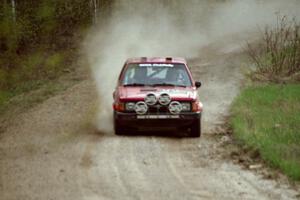 Gary Starr / Bill Tifft at speed in the Two Inlets State Forest in their Dodge Omni GLH Turbo.