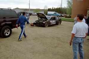 Thanasi Samaras / Constantine Koutras try to tow their Eagle Talon through service, but pull too hard and lose the bumper.