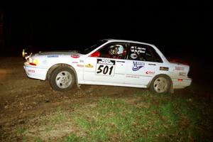 Todd Jarvey / Rich Faber head uphill at the crossroads hairpin in their Mitsubishi Galant VR-4.