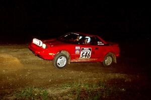 Phil Schmidt / Steve Irwin head uphill at the crossroads hairpin in their Toyota MR2.