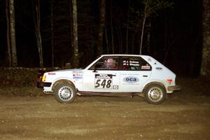 John Zoerner / John Shepski head uphill at the crossroads hairpin in their Dodge Omni GLH Turbo.