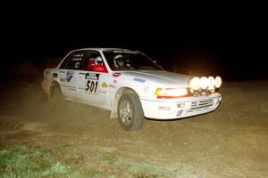 Todd Jarvey / Rich Faber drift through the crossroads sweeper on the final stage in their Mitsubishi Galant VR-4.