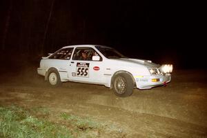 Colin McCleery / Jeff Secor drift their Merkur XR4Ti through the crossroads sweeper on the final stage of the rally.
