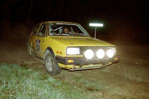 Mark Buskirk / Paul Fernandez drift their VW GTI at the crossroads on the final stage of the night.