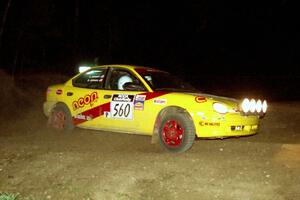 Dave Johnson / Shannon Johnson at speed at the crossroads in their Dodge Neon ACR on the final stage of the night.
