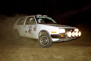 Art Burmeister / Rob Dupree drift their VW GTI through the crossroads on the final stage of the night.