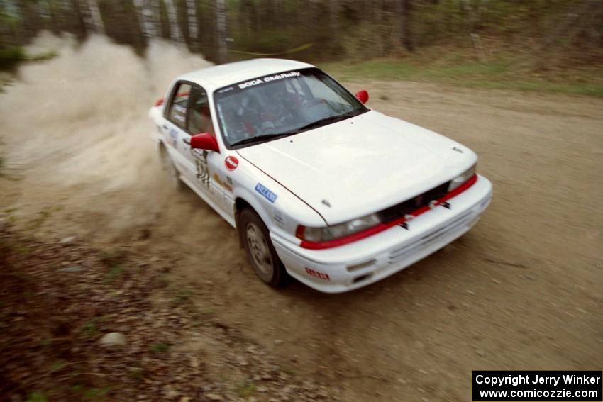 Todd Jarvey / Rich Faber drift their Mitsubishi Galant VR-4 through a 90-right on Indian Creek Rd., SS1.