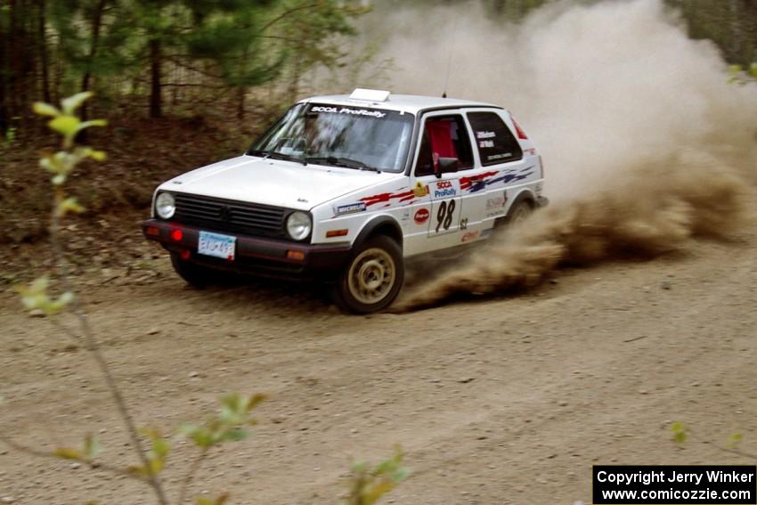 Bob Nielsen / Ed Wahl at speed through a 90-right on Indian Creek Rd.,SS1, in their VW GTI.
