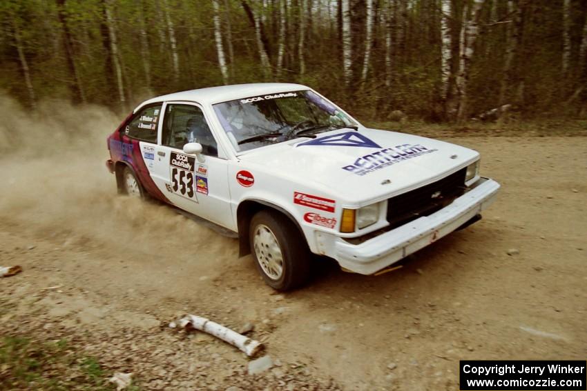 The Jerry Brownell / Jim Windsor Chevy Citation drifts through a 90-right on Indian Creek Rd., SS1.