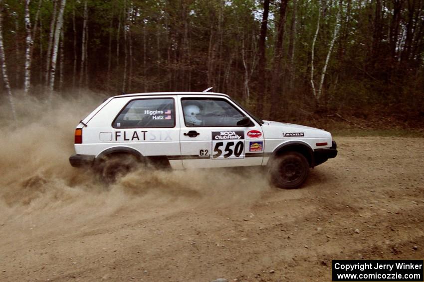 Aaron Hatz / Brendan Higgins drift through a 90-right on Indian Creek Rd., SS1, in their VW GTI.